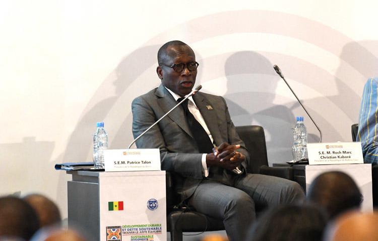 Patrice Talon, the president of Benin, during a conference co-organized by the International Monetary Fund (IMF) on sustainable development and debt in Diamniadio, Senegal, on December 2, 2019. Authorities in Benin on December 20 arrested journalist Ignace Sossou on a defamation complaint filed by a government minister. (AFP/Seyllou)