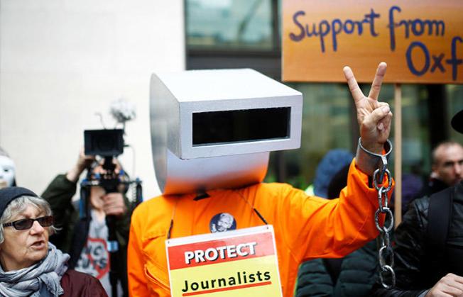 A demonstrator dressed as a whistle protests outside of a London court holding a hearing on the U.S. extradition case of WikiLeaks founder Julian Assange in October 2019. (Reuters/Henry Nicholls)