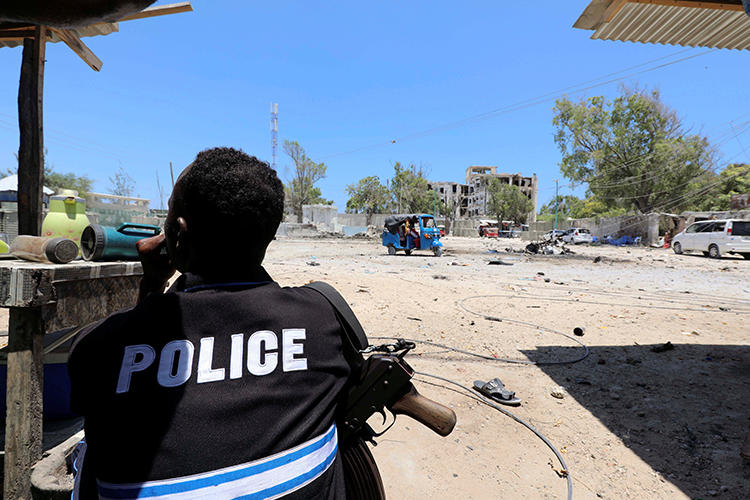 A police officer is seen in Mogadishu, Somalia, on March 23, 2019. Somali authorities recently shut down local broadcaster City FM and briefly detained its staffers. (Reuters/Feisal Omar)