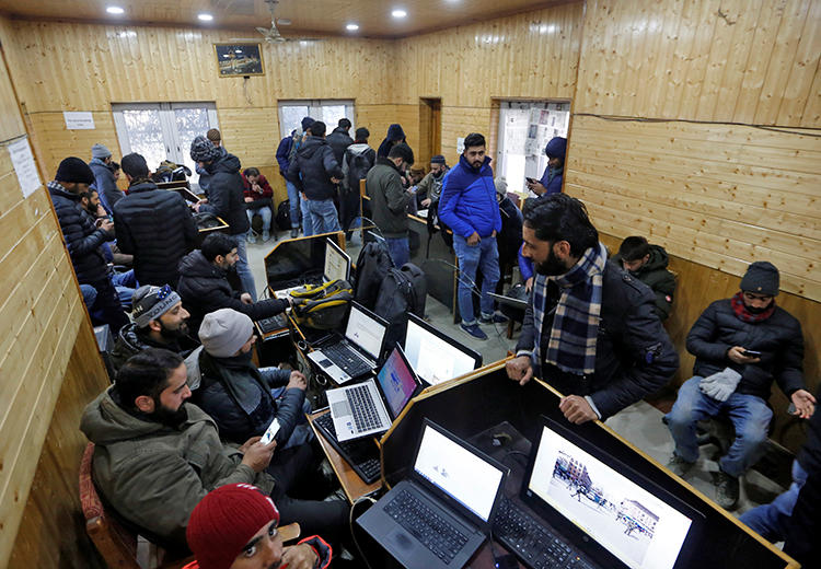 Journalists use the internet inside a government-run media center in Srinagar on January 10, 2020. The Indian Supreme Court today criticized internet restrictions that have obstructed the media for five months. (Reuters/Danish Ismail)