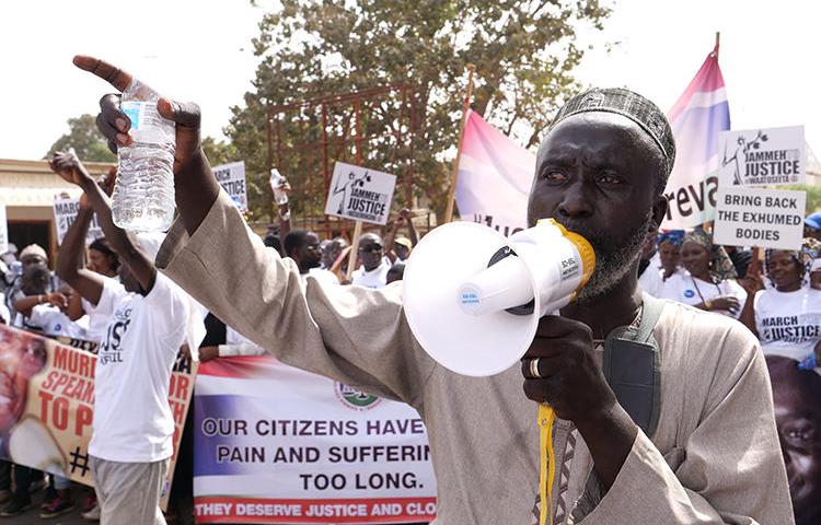 A demonstrator is seen in Banjul, Gambia, on January 25, 2020. Two radio stations were recently shut down and their staffers arrested over their coverage of the protests. (AFP/Romain Chanson)