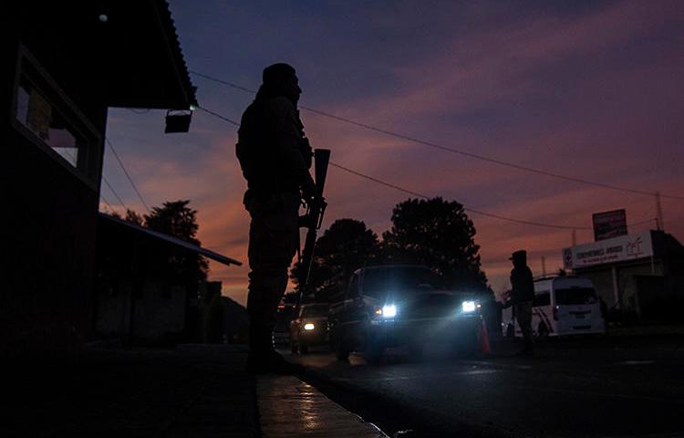 A checkpoint controlled by the community police in Cheran, Michoacán state, in December 2019. The body of journalist who was reported missing in the Mexican state was found in January. (AFP/Pedro Pardo)