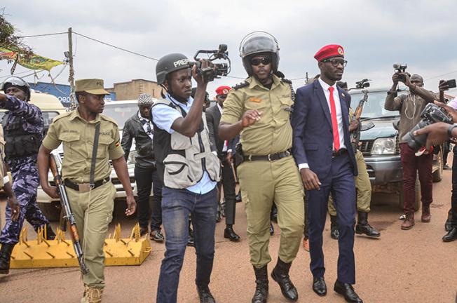Ugandan politician Robert Kyagulanyi, also known as Bobi Wine, is seen in Kasangati on January 6, 2020. Four journalists were arrested during Wine's visit to Kasangati, and others were questioned by police at another event. (AFP)
