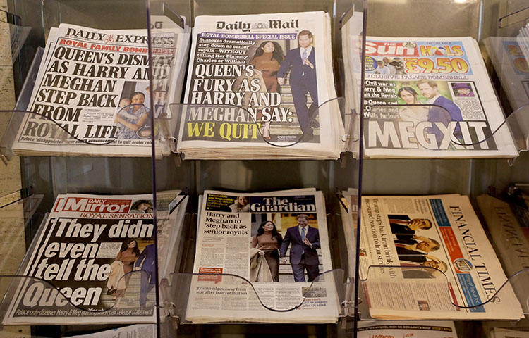 Newspapers are sold in London on January 9, following the statement by the Duke and Duchess of Sussex on their plan to step back from royal duties. In their statement, the couple said they plan to allow access to 'credible media' and no longer use the royal press rota system. (AP/Kirsty Wigglesworth)