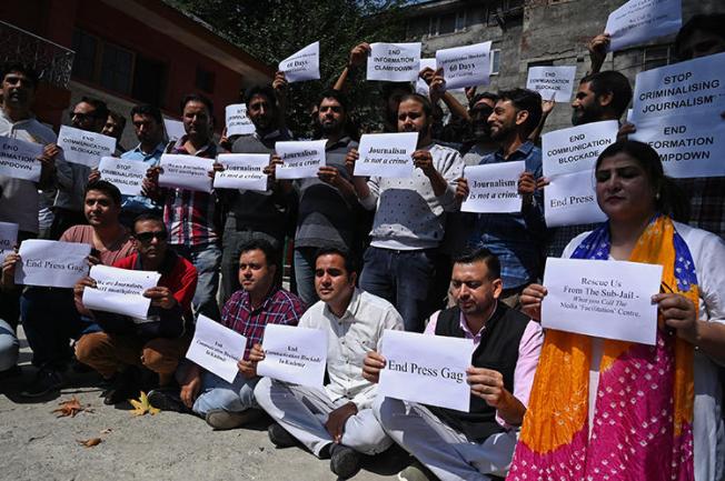 Journalists protest against restrictions of the internet and mobile phone networks at the Kashmir Press Club in Srinagar in October 2019. Jammu and Kashmir police have questioned three journalists this month, and internet access has yet to be fully restored. (AFP/Tauseef Mustafa)