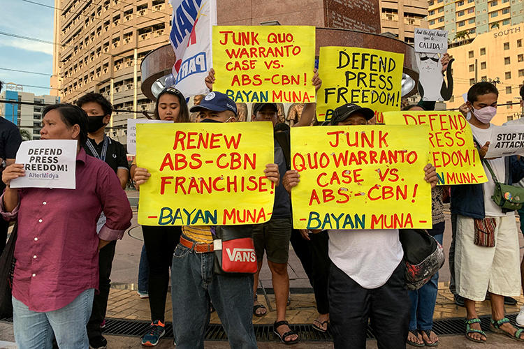 People attends a protest in support of broadcaster ABS-CBN in Manila, the Philippines, on February 10, 2020. Philippine Solicitor General Jose Calida recently filed a petition against the broadcaster with the Supreme Court. (AFP/Ted Aljibe)