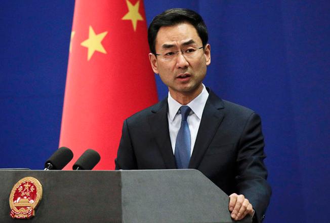 Chinese Foreign Ministry spokesperson Geng Shuang speaks in Beijing on January 29, 2019. Geng announced today that three Wall Street Journal journalists will be expelled from the country. (AP/Andy Wong)