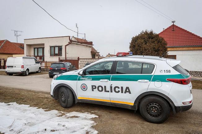 A police car is seen in Velka Maca, Slovakia, on February 27, 2018. Slovak authorities recently charged journalist Michal Havran with criminal defamation and slander. (AP/Michal Smrcok/News and Media Holding)