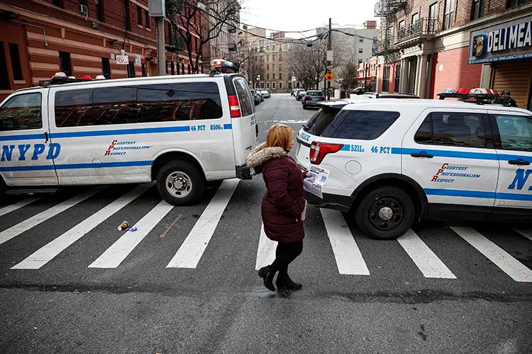 New York City police vehicles are seen on February 9, 2020. The NYPD recently cited anti-terrorism legislation in a subpoena seeking a journalist's data from Twitter. (AP/John Minchillo)