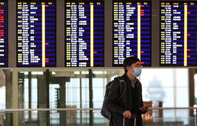 A man is seen in Hong Kong International Airport on February 7, 2020. Immigration officials recently barred journalist Michael Yon from entering the city. (Reuters/Hannah McKay)
