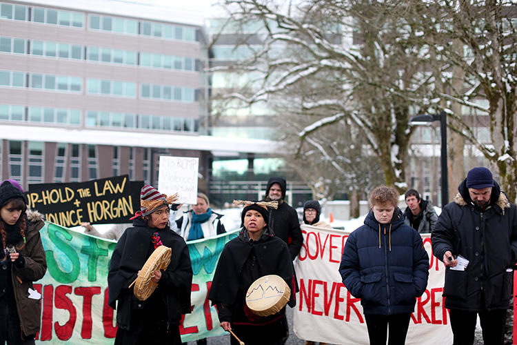 Supporters of the Wet’suwet’en Nation indigenous group, who oppose the construction of the Coastal GasLink pipeline, protest outside the provincial headquarters of the Royal Canadian Mounted Police (RCMP) in Surrey, British Columbia, Canada, on January 16, 2020. In early February, the RCMP prevented journalists from covering the takeover of an indigenous protest camp. (Reuters/Jesse Winter)