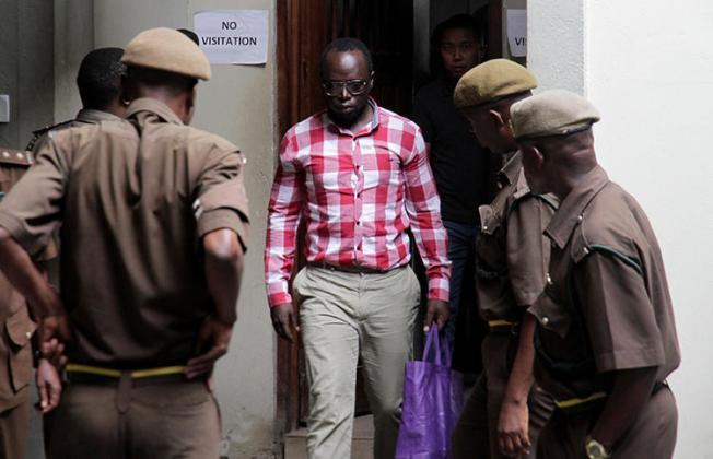 Investigative journalist Erick Kabendera is seen in Dar es Salaam, Tanzania, August 19, 2019. Kabendera was released today from detention but faces large fines. (Reuters/Emmanuel Herman)