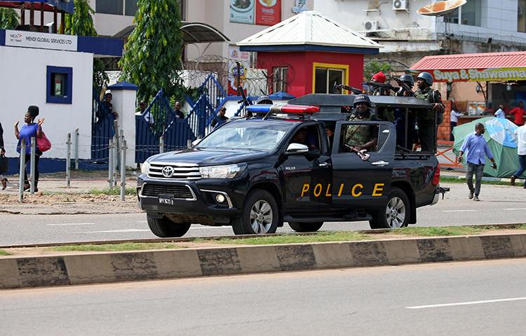 A police vehicle is seen after dispersing members of the Islamic Movement of Nigeria in Abuja on July 23, 2019. Journalist Alex Ogbu recently died at an Islamic Movement of Nigeria protest. (Reuters/Afolabi Sotunde)