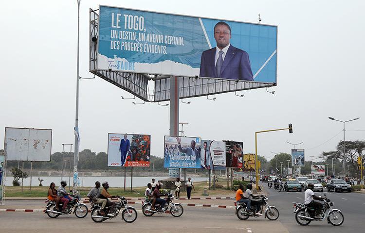 A billboard of President Faure Gnassingbe is seen in Lome, Togo, on February 19, 2020. CPJ recently joined a letter calling for the Togolese government to maintain internet access throughout the upcoming election. (Reuters/Luc Gnago)