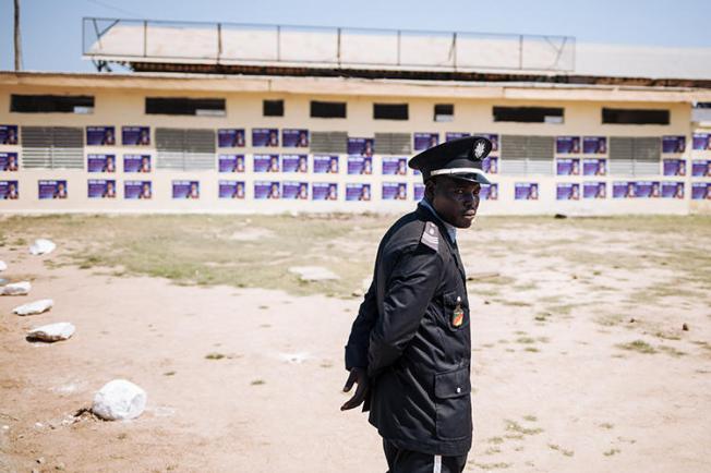 A police officer is seen in Cameroon's Far North Region on September 29, 2018. Journalist Adalbert Hiol has been jailed in Cameroon since November 2019. (AFP/Alexis Huguet)