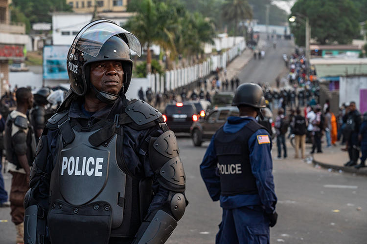 Police are seen in Monrovia, Liberia, on January 6, 2020. Police recently arrested journalist Kolubah Bobo Akoi over his Facebook posts. (AFP/Carielle Doe)