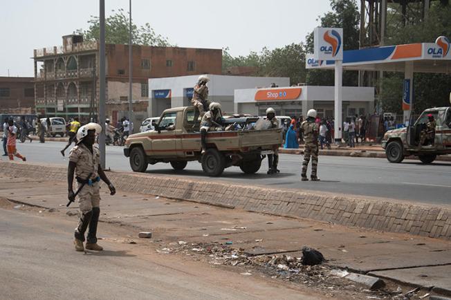 Security forces are seen in Niamey, Niger, on March 15, 2020. Police recently arrested journalist Kaka Touda Mamane Goni over his posts on social media about the COVID-19 pandemic. (AFP/Boureima Hama)