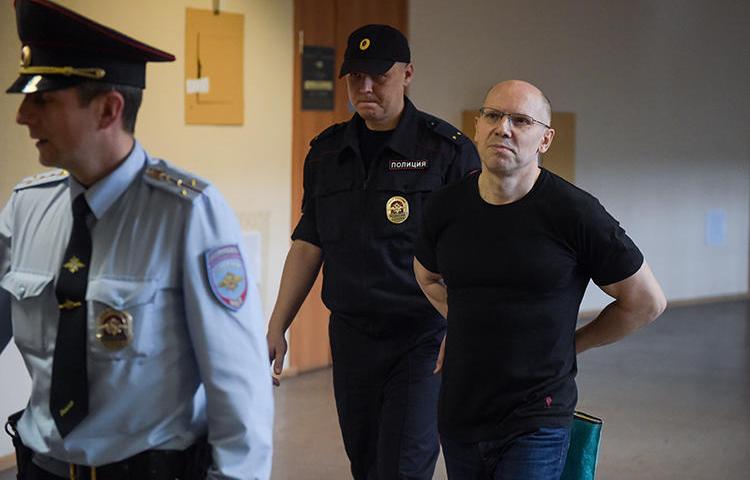 Journalist Igor Rudnikov is seen in Saint Petersburg, Russia, on June 17, 2019. Rudnikov was released from prison last year, but has faced opposition from local Kaliningrad officials and is struggling to continue publishing his paper. (AFP/Olga Maltseva)