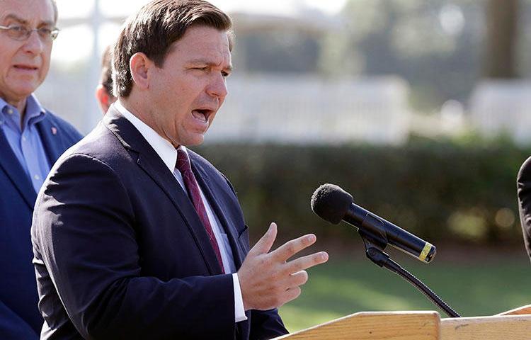 Florida Governor Ron DeSantis is seen in The Villages, Florida, on March 23, 2020. Authorities at the Florida State Capitol recently barred journalist Mary Ellen Klas from attending a news briefing by DeSantis. (AP/John Raoux)
