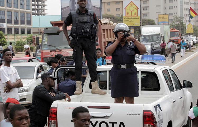 Police officers are seen in Accra, Ghana, on March 28, 2018. Police recently arrested Radio Tongu director Bestway Zottor, and authorities suspended the station's broadcast license. (Reuters/Francis Kokoroko)