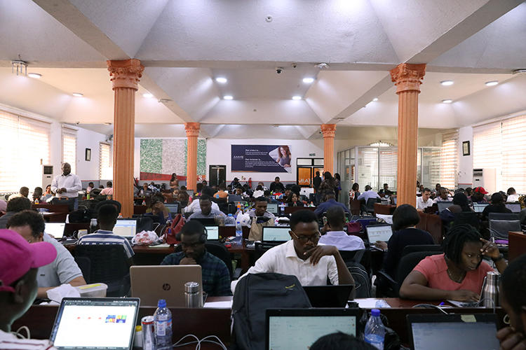 People use computers in Lagos, Nigeria, on January 20, 2020. Nigerian journalists recently spoke with CPJ about their concerns over a proposed social media bill. (Reuters/Temilade Adelaja)