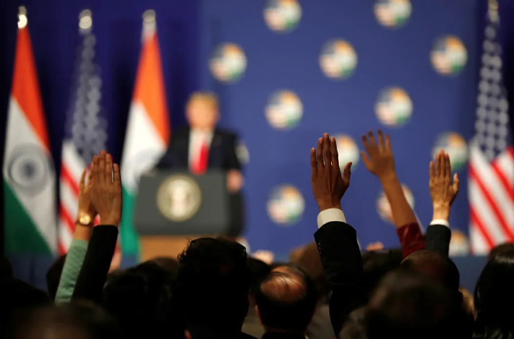 Members of the media raise their hands to ask questions as Trump holds a news conference in New Delhi on February 25, 2020. The Trump administration has retreated from the traditional U.S. role of defending press freedom worldwide. (Reuters/Adnan Abidi)