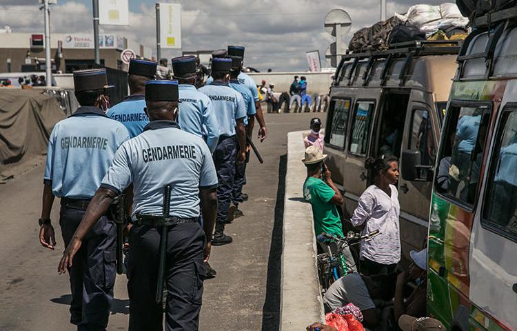 Gendarmes are seen in Antananarivo, Magascar, on April 7, 2020. Madagascar authorities recently jailed journalist Arphine Helisoa on false news and incitement allegations. (AFP/Rijasolo)