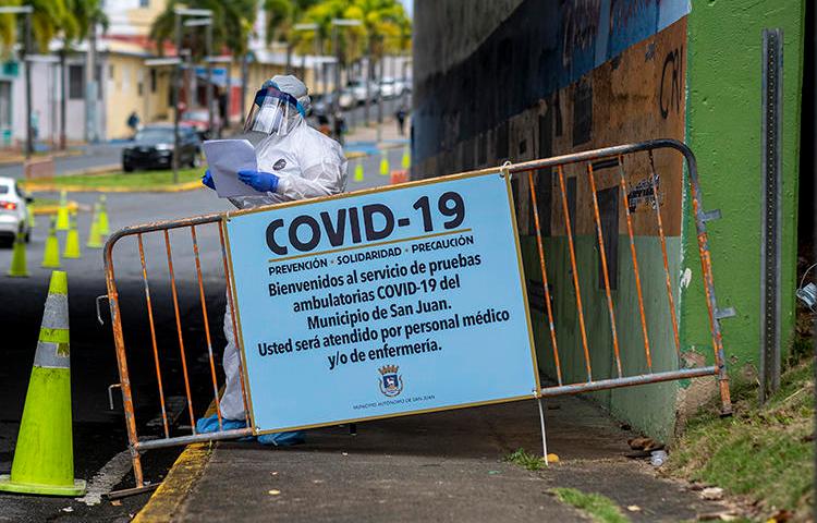 A COVID-19 testing site is seen in San Juan, Puerto Rico, on March 25, 2020. Puerto Rican authorities recently passed a law threatening jail time for spreading 'false information' about the pandemic. (AFP/Ricardo Arduengo)
