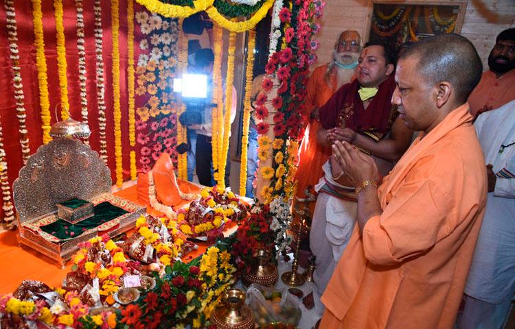 Chief Minister of Uttar Pradesh state Yogi Adityanath prays in Ayodhya, India, on March 25, 2020. Police in the state launched a criminal investigation into the editor of The Wire for his reporting on the ceremony. (AP/Amar Kumar)
