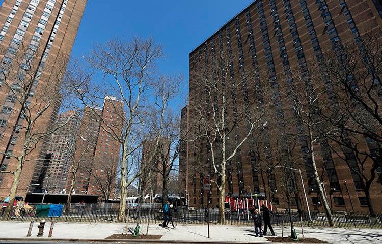 The New York City Housing Authority's John Haynes Holmes Towers are seen on April 4, 2019. CPJ recently spoke with housing reporter Sadef Ali Kully about reporting during the COVID-19 pandemic. (AP/Mark Lennihan)
