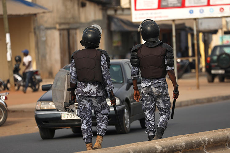 Police officers are seen in Lome, Togo, on February 28, 2020. Togo recently ordered three newspapers to suspend operations. (Reuters/Luc Gnago)