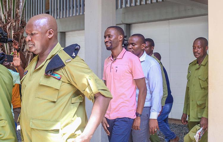 Maxence Melo leaves court in Dar es Salaam yesterday after being convicted of obstructing police investgiations. (Jamii Forums)