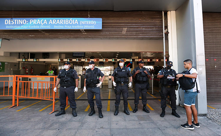 Police officers are seen in Rio de Janeiro, Brazil, on March 23, 2020. Journalist Leonardo Pinheiro was recently shot and killed in Rio de Janeiro state. (Reuters/Sergio Moraes)