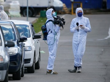 Journalists in protective gear