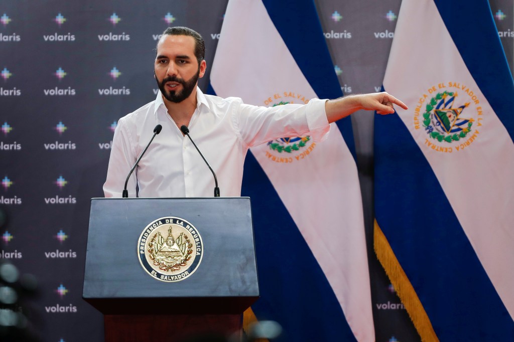 El Salvador's President Nayib Bukele speaks during a ceremony at the airport in San Luis Talpa on October 19. Bukele proposed a new law that would require journalists and media outlets who receive international funds to register as "foreign agents." (Reuters/Jose Cabezas)
