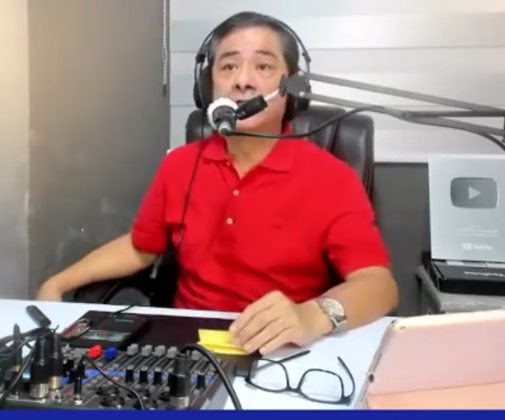 Philippine radio journalist Percival Mabasa, who was shot dead on October 3, 2022, working in the studio.