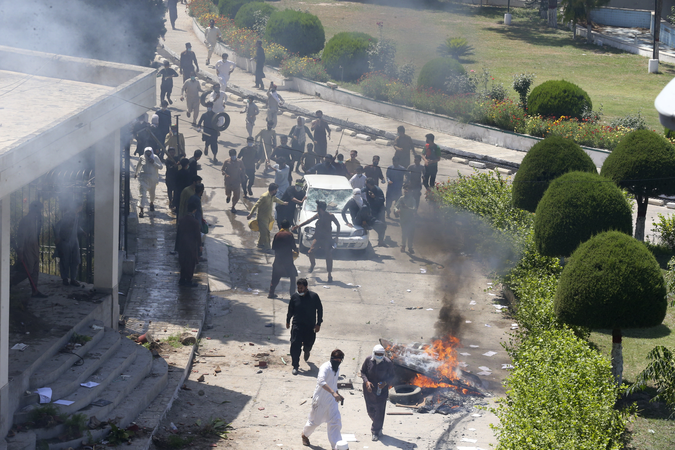 Journalists arrested and attacked, media offices set ablaze amid Pakistan  protests - Committee to Protect Journalists