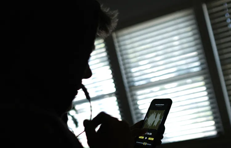 This illustration image created on June 9, 2023, shows a person using a smartphone to record a voice message in Los Angeles.