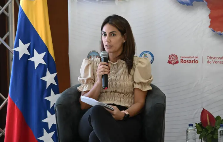 Estefanía Colmenares, editor of Colombia's La Opinión newspaper, speaks into a microphone