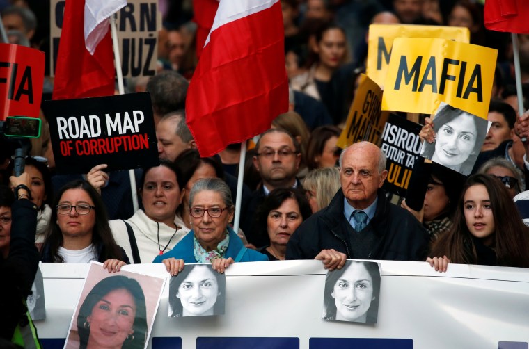 Rose and Michael Vella, parents of late journalist Daphne Caruana Galizia, attend a protest demanding justice over the murder of their daughter and the immediate resignation and investigation of Prime Minister Joseph Muscat in Valletta, Malta, on December 8, 2019.