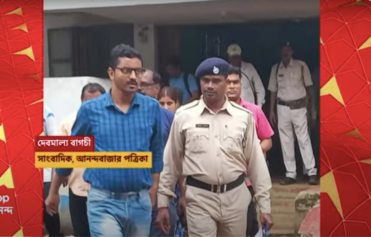 Debmalya Bagchi (left), a correspondent with India's Ananda Bazar Patrika newspaper, is arrested on September 6, 2023. (Photo Credit: TK)