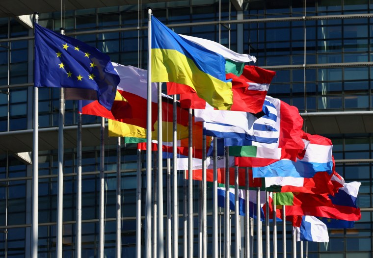 Flags flutter outside of the European Parliament in Strasbourg, France, on June 12, 2023.