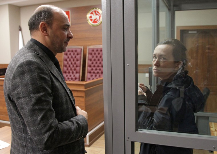 Radio Free Europe/Radio Liberty (RFE/RL) journalist Alsu Kurmasheva, accused of violating Russia's law on foreign agents, talks to her lawyer Edgar Matevosyan as they attend a court hearing in Kazan, Russia, on October 23, 2023.