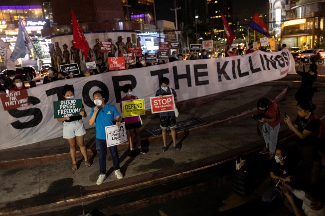 People call for the protection of media workers at a rally following the killing of Filipino radio journalist Percival Mabasa, in Quezon City, Philippines, on October 4, 2022.