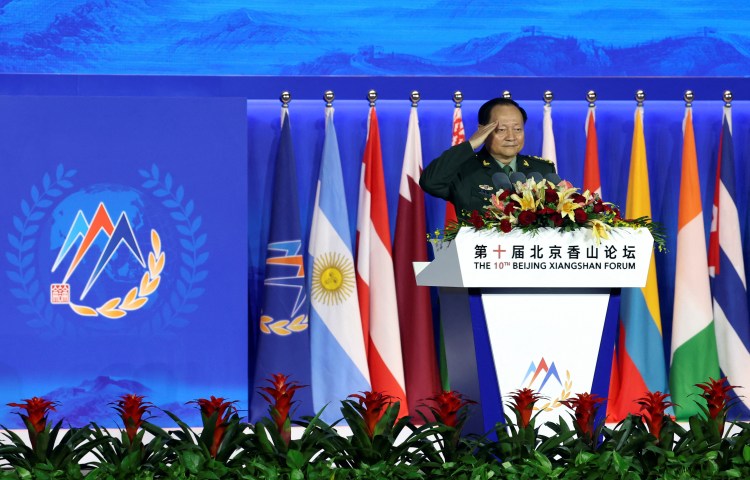 China's Central Military Commission Vice Chairman Zhang Youxia salutes at the Beijing Xiangshan Forum in Beijing, China, on October 30, 2023.