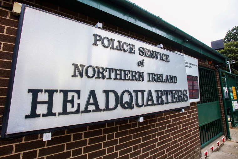 A photograph taken on August 10, 2023 shows the logo of the Police Service of Northern Ireland at the entrance of the headquarters in Belfast.