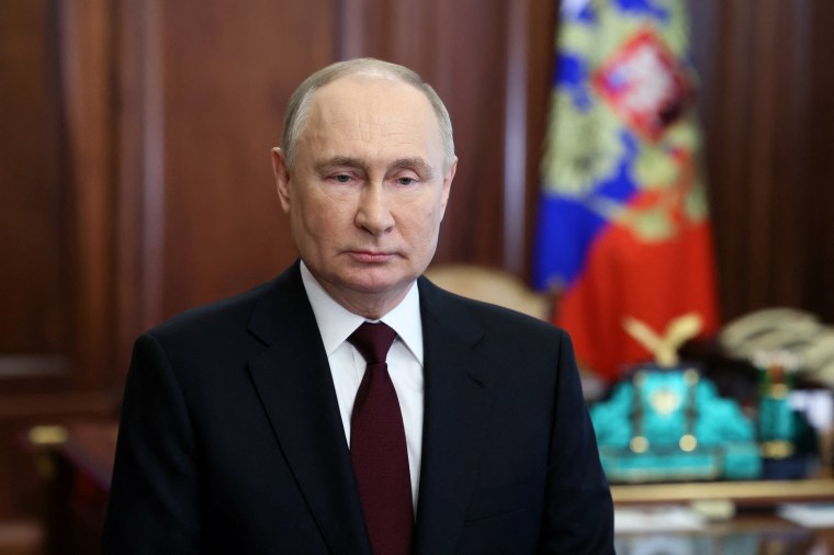 Russian President Vladimir Putin makes a video address in Moscow ahead of the upcoming presidential election, in a picture released on March 14, 2024.