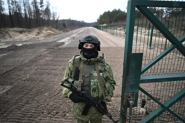 A Belarusian border guard patrols in the Brest region at the border with Ukraine in February 2023. On June 3, 2024, a court in the city of Brest convicted and sentenced journalist Alena Tsimashchuk to five years in prison but the grounds for her charges have not been disclosed. (Photo: AFP/Natalia Kolesnikova)