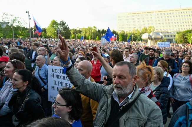 A man gestures as demonstrators protest against government changes at public broadcaster RTVS in Bratislava, Slovakia, May 2, 2024.