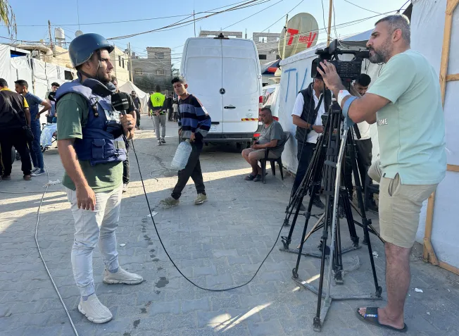 Palestinian Journalist Sami Shehada, whose leg was amputated following his injury while covering events of Israel's military offensive in Nuseirat in April 2024, resumes covering events for Turkish state broadcaster TRT, amid the ongoing conflict between Israel and the Palestinian Islamist group Hamas, in Deir Al-Balah in central Gaza Strip May 13, 2024. (Photo: Reuters/Doaa Rouga)